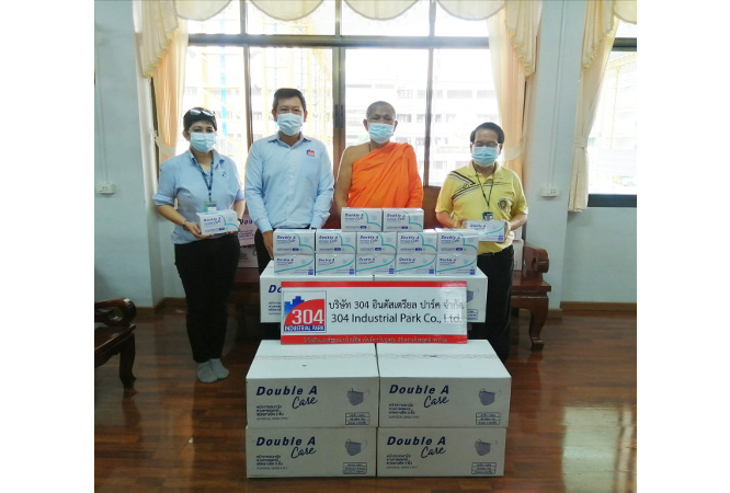 donated masks to monks in Prachinburi Province